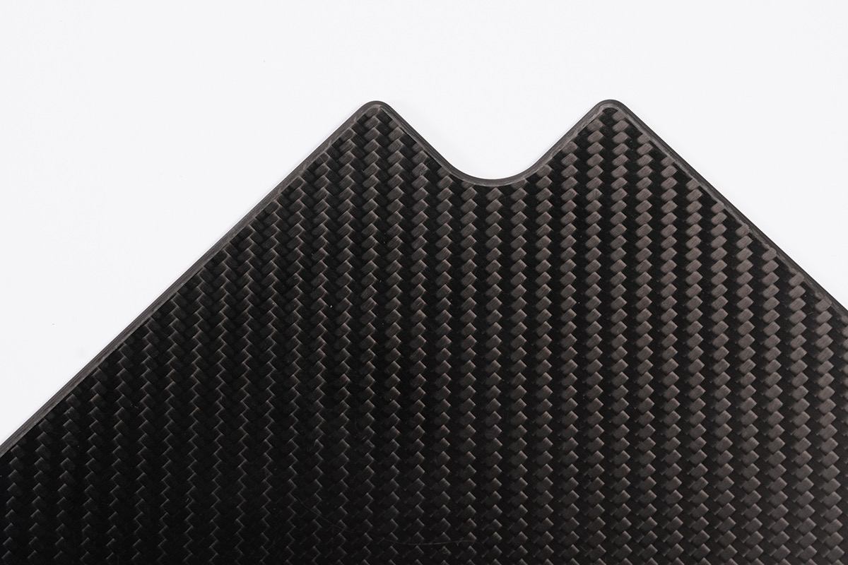 Official twill-weave carbon fiber panel surface and machined edge example